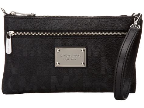 michael kors jet set wristlet black|jet set large logo wristlet.